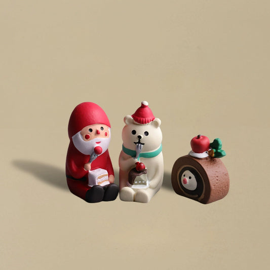 Santa Claus and a polar bear enjoying a cake together, charming Christmas decoration.