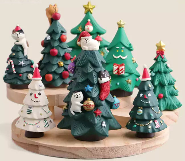 A set of Christmas trees ringing in the holiday spirit, base not included