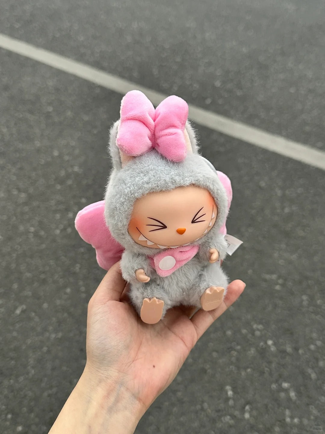 Labubu doll outfit with a cute bow