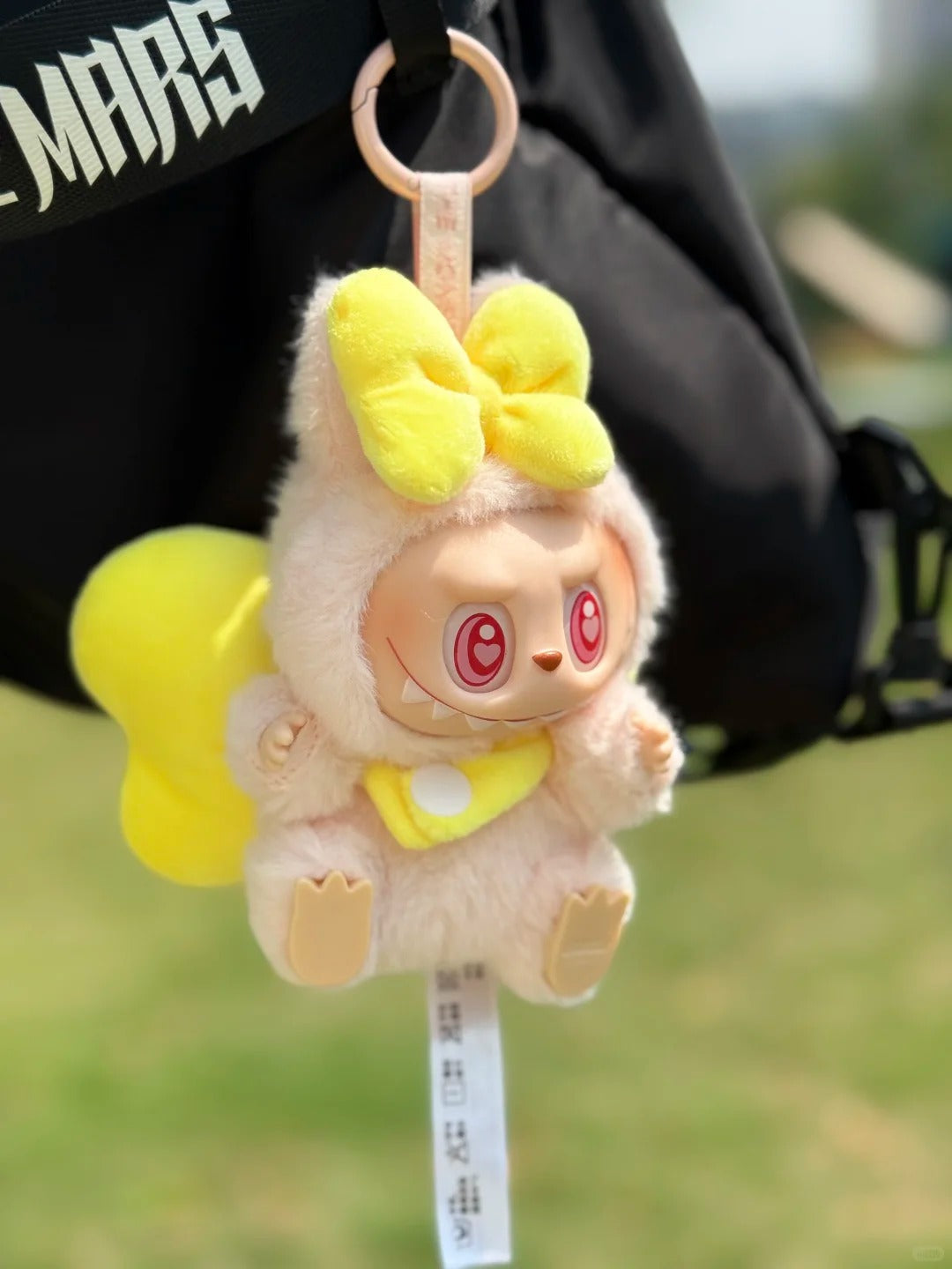 Labubu doll outfit with a cute bow