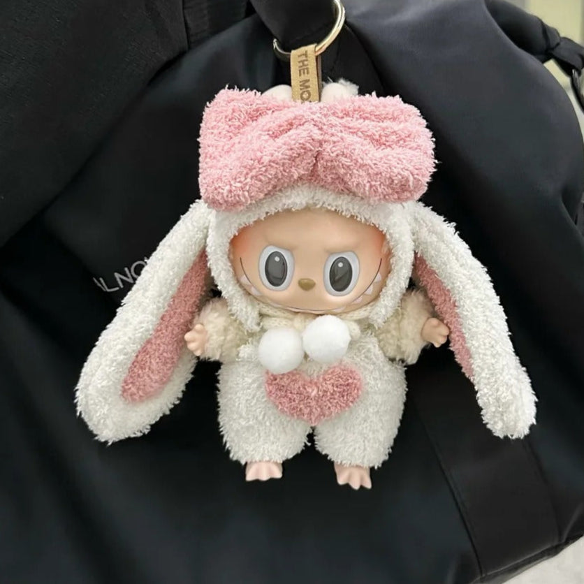 Labubu wearing a cute bunny outfit with floppy ears