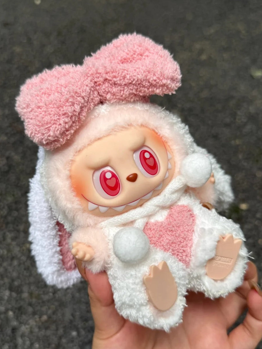 Labubu wearing a cute bunny outfit with floppy ears