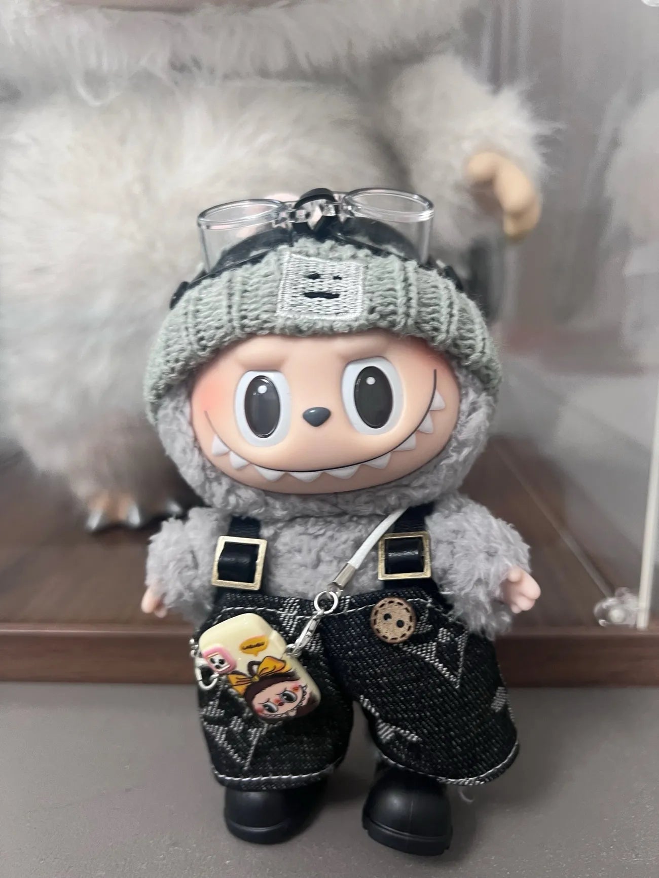 Labubu wearing a trendy street-style black outfit