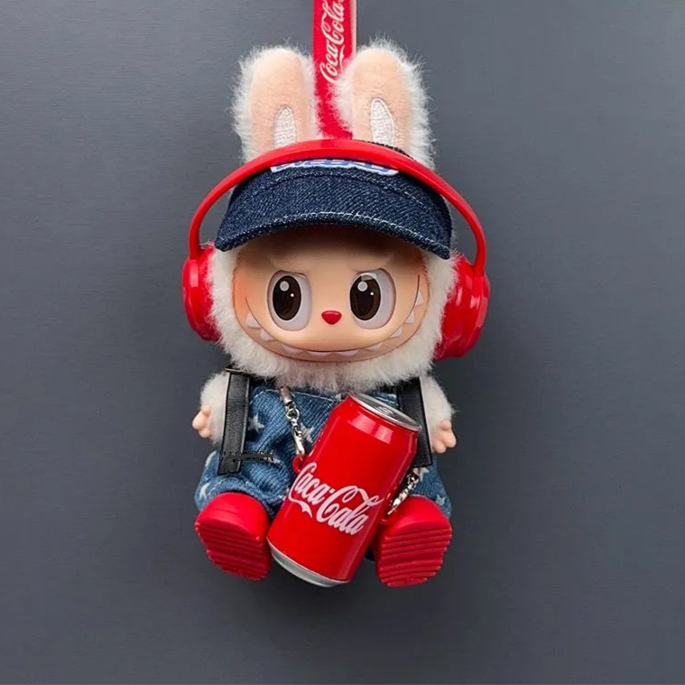 Labubu dressed in a fun outfit with a cola surprise theme
