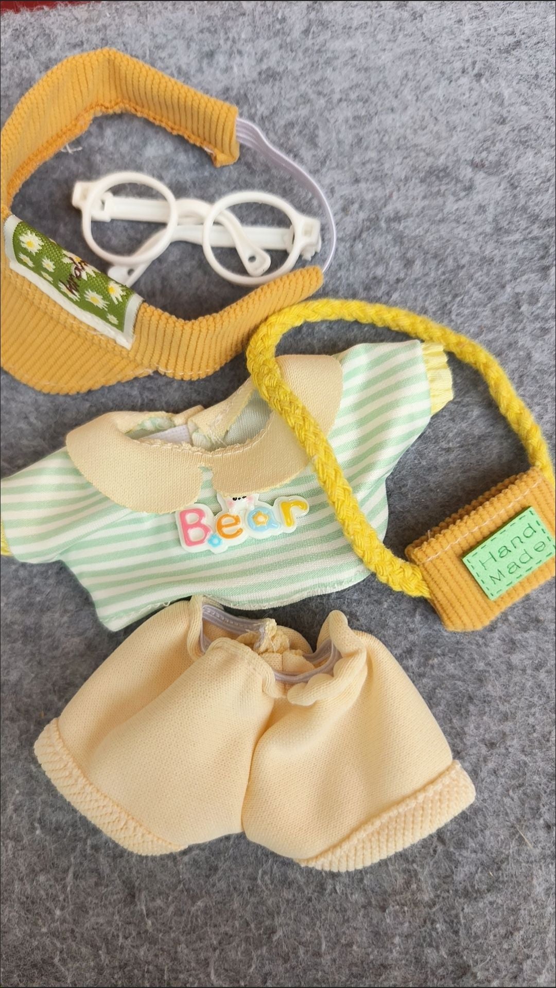Labubu enjoying a sunny picnic in a cheerful outfit